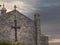 Part of Galway Cathedral, Wall and rood with crosses, Calm and peaceful sunset sky