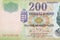 Part of green Hungary 200 Forint banknote fragment