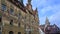 Part of historic Town Hall with beautiful paintings and Ulm Minster, Ulmer Muenster, in Ulm on Romantic Road in South Germany