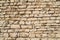 Part of natural contrast masonry wall stone granite is a pattern of texture, material and background with colored stones.