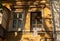 A part of old building facade of typical houses in Odessa old town city center with linen and clothes drying on