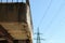 Part of an old concrete staircase. Transmission tower in the background