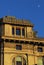 Part of an old palace in the sun and the blue sky in Bologna (Italy)