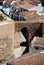 Part of the old town wall and stone arched gateway, Antequera, Spain.