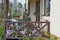 Part of an open brown wooden veranda against the wall