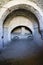 part of Ottoman empire architectural arch-shaped structure ruins at GjirokastÃ«r castle in Albania.