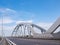 Part of road and railroad bridge with steel arches