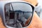 Part of a sailboat reflected on sunglasses