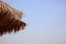 Part of the thatched roof of the Asian country, beautiful sky background, sunny day, background image