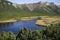 Part of the Trojrohe lake with the background of the Belianske Tatras.