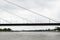 Part view at the bridge and its construction under the cloudy sky at the rhine riverbank in dÃ¼sseldorf germany