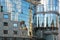 Part view of a glass facade with beautiful reflections and mirroring