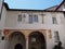 Part of white medieval courtyard of Madonna del Sasso church in Locarno city on Lake Maggiore in Switzerland