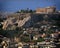 Parthenon famous temple and Plaka old neighborhood under acropolis hill, Athens Greece