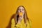 Partial of caucasian female teenage eating orange