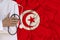 Partial photograph of the doctor in uniform against the background of the national flag of Tunisia on delicate shiny silk, the