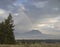 Partial rainbow over Mt. Moran on a cloudy day