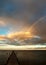 Partial rainbow over the sea at evening