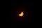Partial solar eclipse in maximum phase, observation from Poland. The moon obscures the disk of the sun.