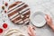 partial top view of person putting piece of delicious homemade cake