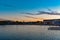 Partial view of Bayside Stadium and Shamu Stadium on colorful sunset background at Seaworld Theme Park .