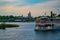 Partial view of Cinderella`s Castle and Disney Ferry boat on colorful sunset bakcground at Walt Disney World  area  1