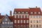 Partial view of the colorful facades of the typical buildings in front of the Nyhavn canal in Copenhagen