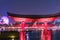 Partial view of illuminated sphere and japanese arch at Epcot 46