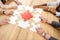 partial view of multiracial business people collecting blank puzzles at wooden table,