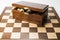 Partially open chess box with kings protruding