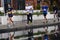 Participants of 6 Moscow Marathon. Water reflection in a puddle