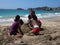 Participants in a caribbean sand castle competition