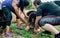 Participants obstacle course going through a pipe