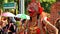 Participants parade in puppet costumes while in action, Reog Ponorogo player