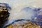 Particular of beach with rocks in summer