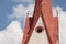 Particular of the bell tower of the church in Selva di Val Gardena into the Dolomites area