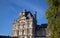 Particular of facade of Louvre Museum, one of the most famous museums in the world, Paris, France