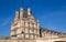 Particular of facade of Louvre Museum, one of the most famous museums in the world, Paris, France.