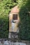 Particular small cylindrical masonry structure and hemispherical cover, inside the Boboli Gardens in Florence.