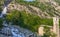 The particular waterfall of Noasca in Piedmont/ Italy is located behind the houses near  the Great National Park