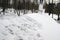 Partly clean roof covered thick winter snow layer