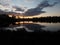 Partly cloudy sunset over Walden Pond, Pine River, Minnesota