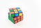 Partly finished solution puzzle cube isolated on w