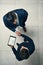 Partnering together on a new project. High angle shot of two businessmen shaking hands in an office.