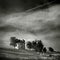 Parts of a ruined house with dramatic sky