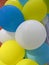 Party balloons in blue, white and yellow. Celebrating a birthday or wedding.