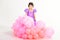 Party balloons. Happy birthday. Little girl in princess dress. Kid fashion. Little miss in beautiful dress. Childhood