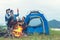 Party Camping.  Group family travel enjoy party and roasted sausages relax in vacations. Campfire at touristic camp at nature in o