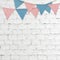 Party flags hanging on white brick wall background