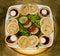 Party Food - Small home-made pastry tartlets on square white plate